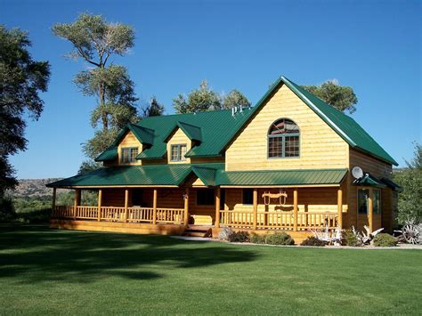 brown house kelly green metal roof|green metal roof.